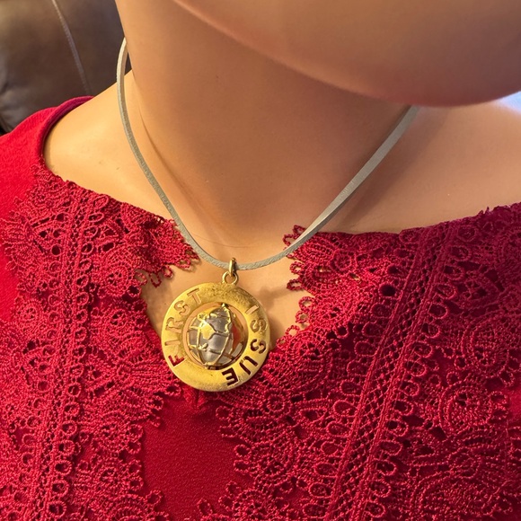 VTG G/T pendant featuring spinning globe w/text “First Issue” on outer ring - Picture 2 of 7